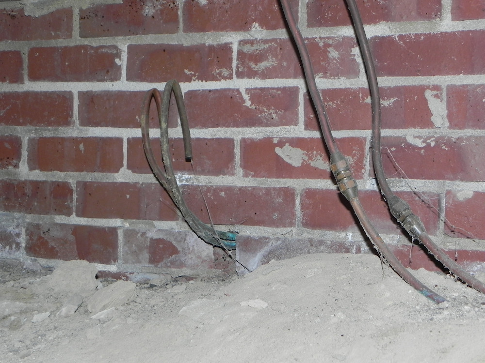 Copper fuel lines in crawlspace.